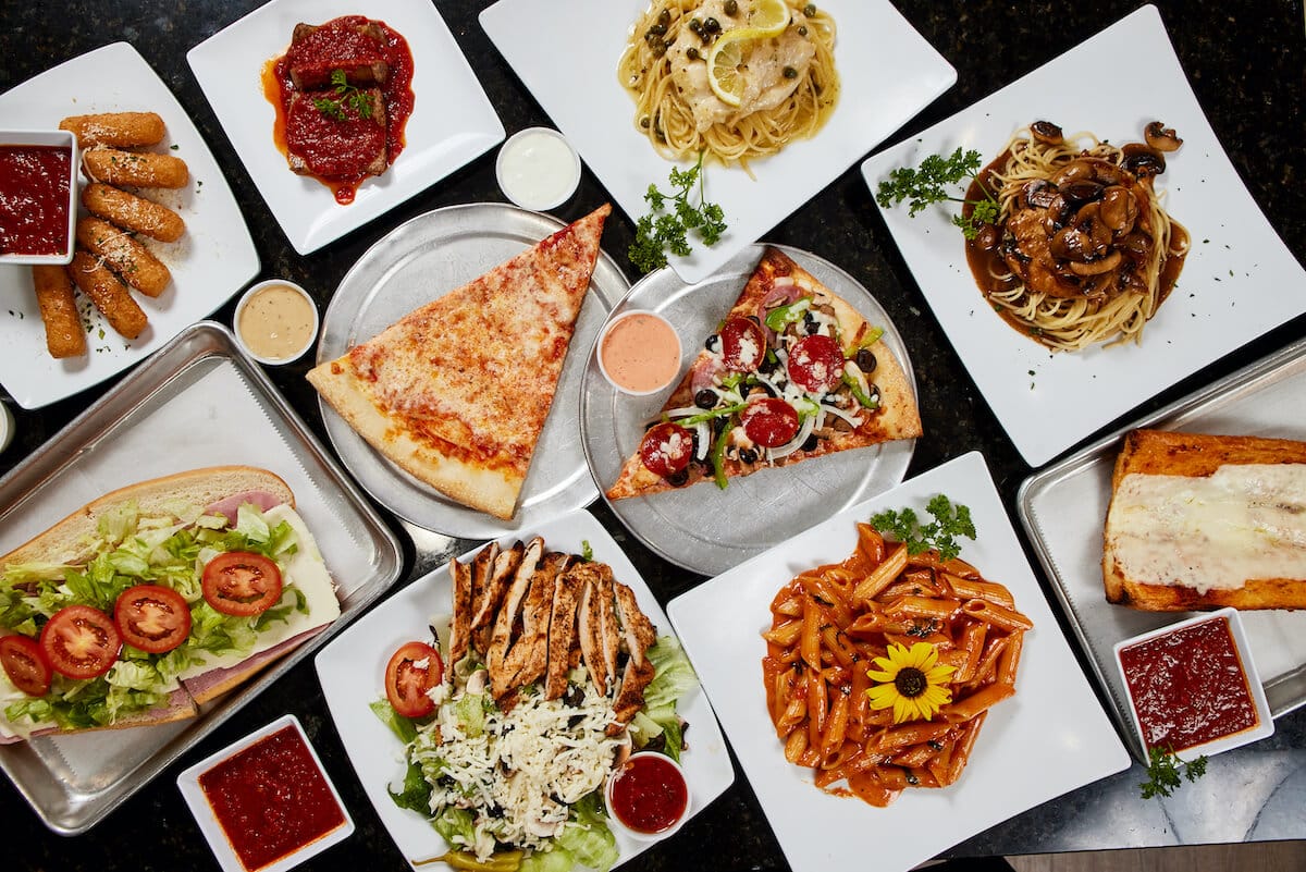 A spread of Tony's New York style pizza and Italian dishes